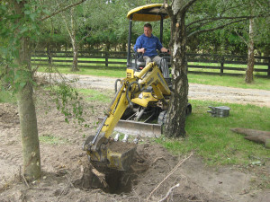 Construction worker digging